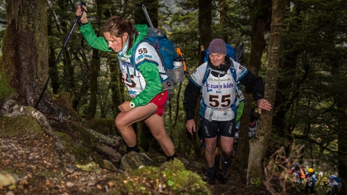 Amy Manning and Darren Clay from Team Vistalight Central making their way up the first climb of the race towards Brewster Hut.
