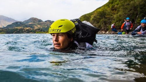 Spanning nearly 350 miles across some of the most beautiful and rugged country in the world, the GODZone Adventure race is one of the most demanding events on the planet. In late February, 52 teams of four took on the week-long challenge. They trekked about 78 miles, mountain biked 173 miles, and canoe and kayaked 84 miles in a point-to-point course based out of Lake Wanaka, New Zealand. With teams as far as 125 miles apart, photographer Mead Norton experienced his own adventure trying to capture the event. Hanging out of helicopters, tracking down teams in jet boats, and trudging through much of the same terrain as the competitors, Norton gives us a behind-the-scenes look at one of the gnarliest races on the planet. In the end, only 14 teams crossed the finish line.
Photo: Louise Mark with the rest of Team Balance Sports Nutrition heading out on the swim—in sub 50 degree water—at the end of the coastal orienteering leg of the race.