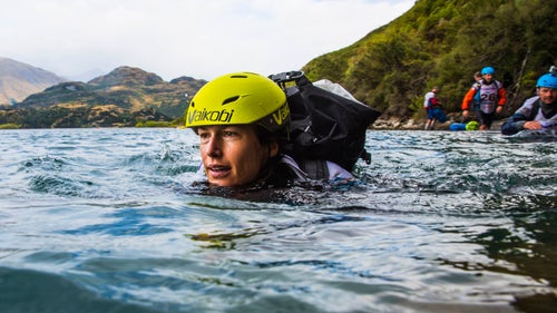 Spanning nearly 350 miles across some of the most beautiful and rugged country in the world, the GODZone Adventure race is one of the most demanding events on the planet. In late February, 52 teams of four took on the week-long challenge. They trekked about 78 miles, mountain biked 173 miles, and canoe and kayaked 84 miles in a point-to-point course based out of Lake Wanaka, New Zealand. With teams as far as 125 miles apart, photographer Mead Norton experienced his own adventure trying to capture the event. Hanging out of helicopters, tracking down teams in jet boats, and trudging through much of the same terrain as the competitors, Norton gives us a behind-the-scenes look at one of the gnarliest races on the planet. In the end, only 14 teams crossed the finish line.
Photo: Louise Mark with the rest of Team Balance Sports Nutrition heading out on the swim—in sub 50 degree water—at the end of the coastal orienteering leg of the race.