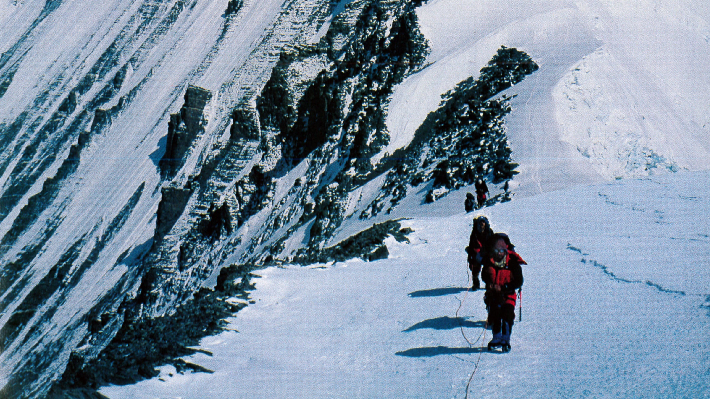 Expedition sleuths ascend the North Ridge on their way up to Camp V. May 1999.