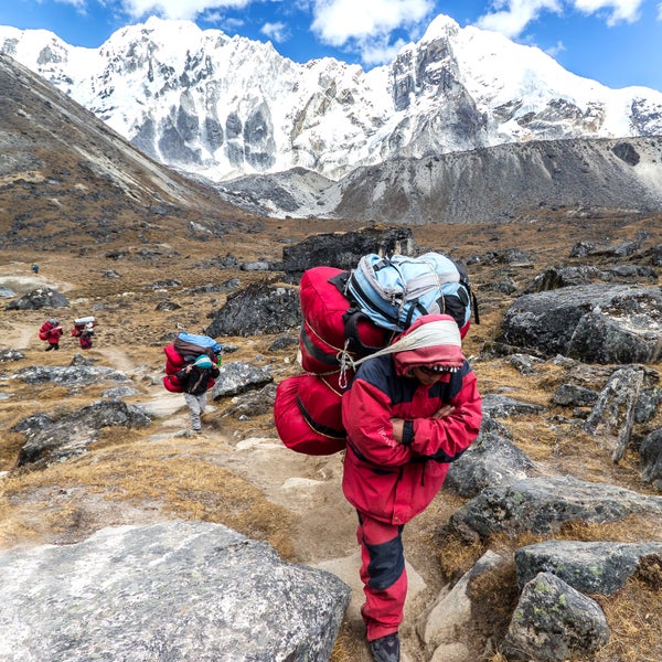 A Sherpa gets paid about $32.50 an hour to carry heavy loads through the dangerous Khumbu Icefall.