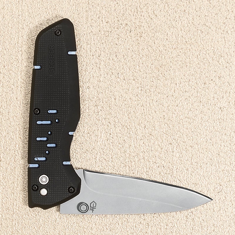 A crafty spring-loaded mechanism on the Skyridge ($45) lets you easily flick open the three-inch stainless-steel blade with one hand. The G-10 handle won’t absorb water, and the modified drop-point shape is equally adept at finely slicing meat and vegetables or whittling sticks around a campfire. gerbergear.com