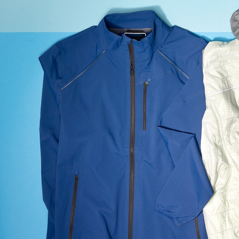 Best For: Playing it cool.
The Test: What we like most about this aerobic-inspired shell is that it doesn’t look like one. “I could get a pre-run coffee without feeling like a running geek,” said a tester. But the reason the First Light ($250) made the cut here is that it doesn’t overheat when you pick up the pace or wilt when the weather gets nasty. The inside of the two-layer nylon never felt clammy when runs turned sweaty, thanks in part to discreet back vents.
The Verdict: A lot of performance hidden elegantly in a casual look. 9.6 oz; aetherapparel.com
Breathability: 4.5
Weatherproofness: 2.5