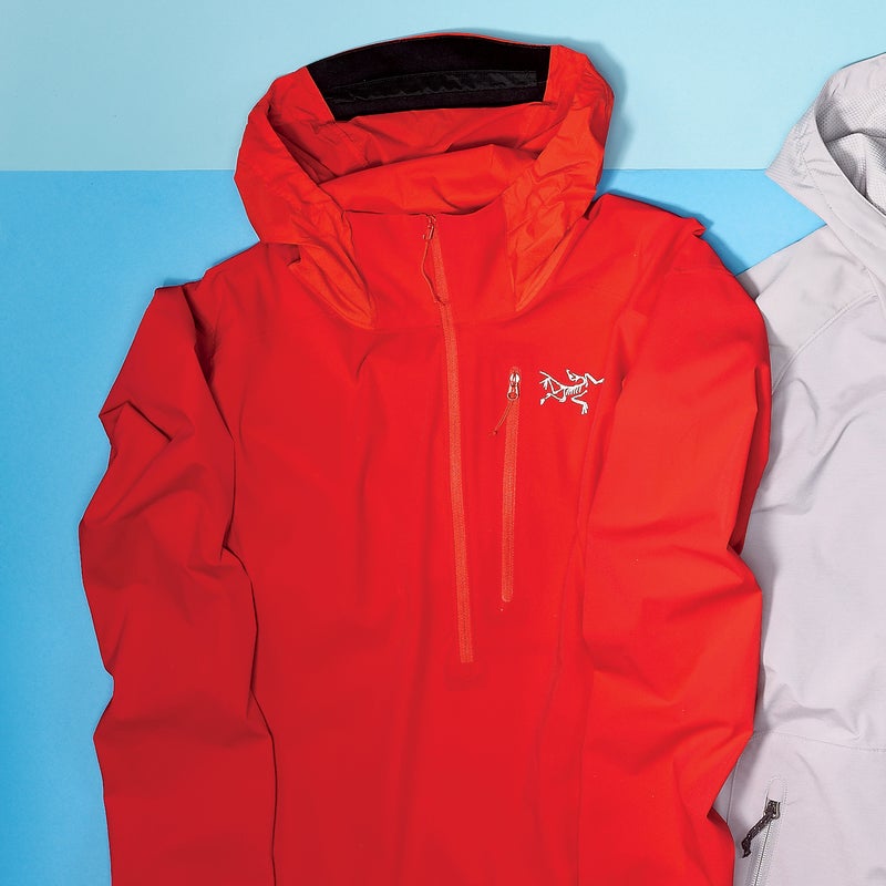 Best For: Moving fast in the mountains. The Test: Cut from a tightly woven, stretchy nylon-elastane blend, the lightweight Psiphon ($149) is purpose-built for rock climbing. The hood can be adjusted with one hand, the stretchy cuffs are designed to stay put when you push them up on your forearms, and two small removable pieces of foam on each side of the waist hem keep the jacket from riding up under your harness. Our favorite feature is the hood stow-away system: a snap keeps it rolled tightly (and not flapping around) when you don’t need it. The Verdict: You don’t have to rock-climb to dig it. We happily ran, biked, and hiked in the Psiphon for months. 10.2 oz; arcteryx.com Breathability: 4.5 Weatherproofness: 3