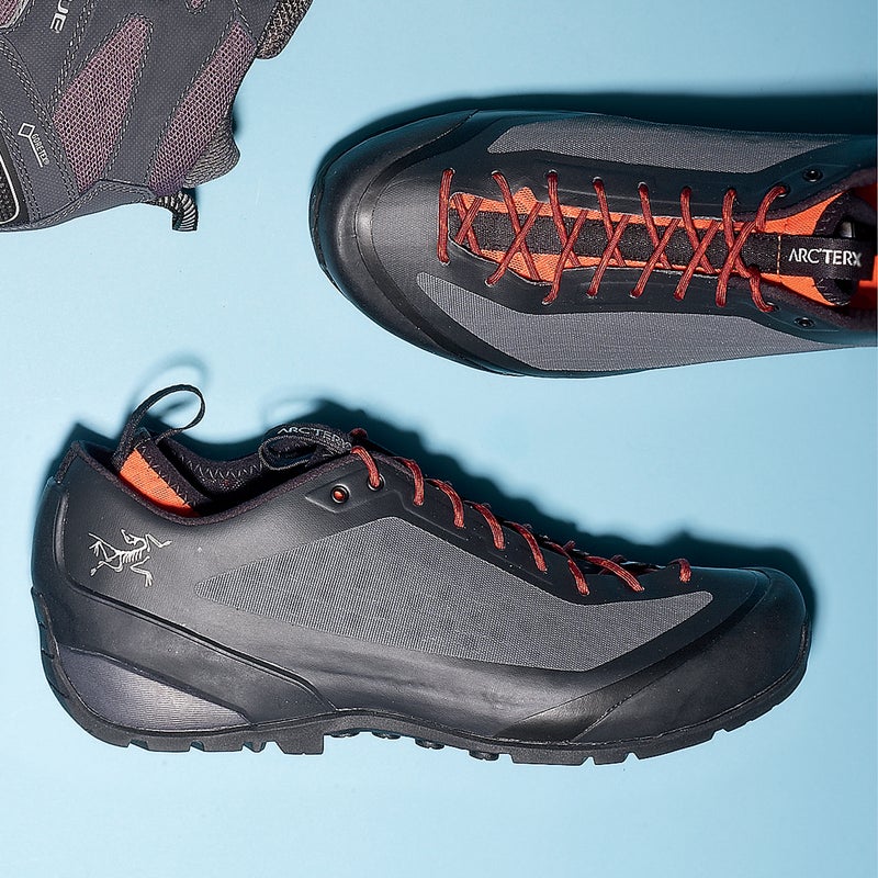 Best For: Serious trail abuse.
The Test: Arc’teryx’s new line of shoes are sleek, durable, and packed with technology. In the Acrux ($190), the tongue was jettisoned in favor of a mesh-lined bootie that keeps your foot snugly in place and prevents debris from getting in. The shoe has zero seams: Arc’teryx laminated the materials together to create a supertough one-piece upper that showed nary a scuff even after six months of frequent use. Extra points for the approach-shoe-style toe rand—great for scrambles.
The Verdict: A bombproof shoe for gnarly terrain. 14.5 oz; arcteryx.com
Comfort: 3.5
Traction: 5