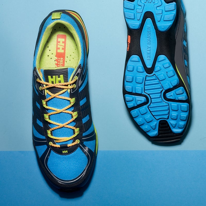 Best For: Weekend escapes.
The Test: At first glance, the low-top Trackfinder ($110) seems like a bendy, cushy running shoe. But once it’s on your foot, it’s surprisingly stiff and stable. One tester carried his 15-month-old daughter on several long day hikes and never complained of ankle soreness. There’s not much padding in the tongue or sides, and the fit is narrow, but most testers appreciated the snug feel. Midsize lugs grip well in varying terrain, and while it’s not as breathable as the La Sportiva, Helly Hansen’s proprietary waterproof-breathable membrane kept the rain from leaking in.
The Verdict: Ideal for long day hikes with a medium pack. 12 oz; hellyhansen.com
Comfort: 4
Traction: 4
