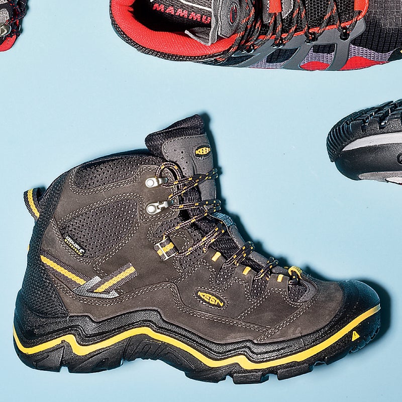 Best For: All-around performance.
The Test: “Cushy like a Cadillac, dependable like a Toyota truck” is how one tester summed up the Durand ($180). Lots of padding and an extra-wide toe box kept feet comfy on longer days, and tough nubuck leather held up like a champ after multiple thrashings through rocky scree fields. Built with Keen’s proprietary polyurethane midsole, the boot is supremely stable. The outsole features grippy rubber that one over-amped tester insisted helped him jump around on wet rocks “like Spider-Man.”
The Verdict: One boot to rule them all—light enough for day hikes, sturdy enough for backpacking. 1.3 lbs; keenfootwear.com
Comfort: 5
Traction: 4