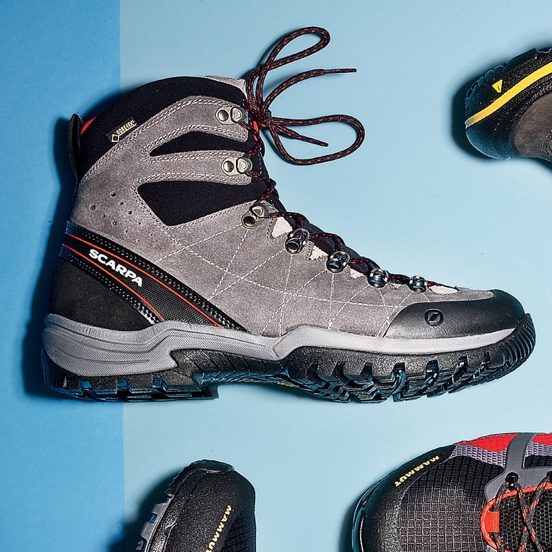 Best For: Heavy loads.
The Test: It can takes weeks or even months to break in a pair of backpacking boots. Not so with the R-evolution ($239). Testers found these high-tops to be all-day comfortable, thanks largely to a redesigned tongue that readily conforms to the foot and allows you to cinch the outer snugly (also removing the chance of blisters). A stiff midsole, burly tread, and an extra-thick suede outer make this the ideal boot for grueling multi-day trips. And the Gore-Tex liner was protective even in summer monsoons.
The Verdict: Planning an AT through-hike? Get these. 1.4 lbs; scarpa.com
Comfort: 4.5
Traction: 5