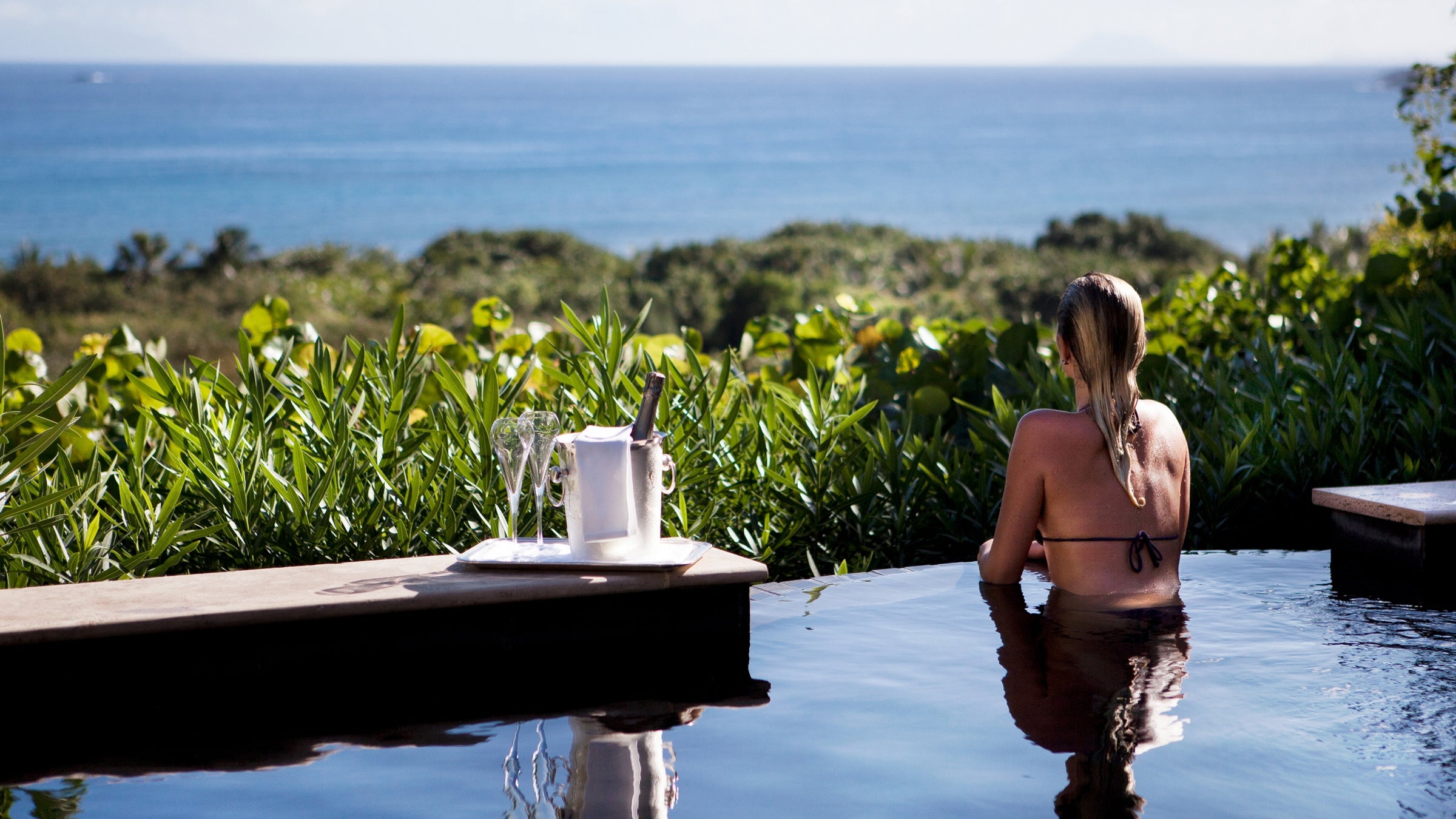Hotel Le Toiny's pools are made of lava stone and look out over St. Barth's calming views.