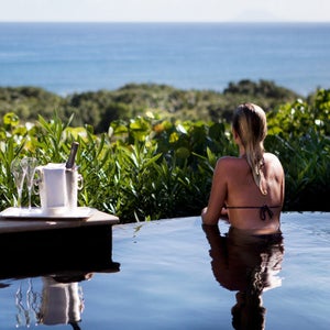 Hotel Le Toiny's pools are made of lava stone and look out over St. Barth's calming views.