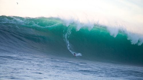 “This was right at the end of the day of a really big day. We were all packing up ready to leave and Brad and Mike Parsons were starting to put their tow rope back into the ski when that big lump came in out the back. They buzzed out real quick and next thing you know Gerlach was on this 68-foot wave that ended up winning the 2005 XXL for biggest wave.”