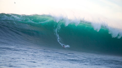 “This was right at the end of the day of a really big day. We were all packing up ready to leave and Brad and Mike Parsons were starting to put their tow rope back into the ski when that big lump came in out the back. They buzzed out real quick and next thing you know Gerlach was on this 68-foot wave that ended up winning the 2005 XXL for biggest wave.”