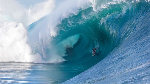“That’s one of the biggest, thickest barrels that anybody has ever gotten onto out there. Laird Hamilton towed Koa into that wave. That’s such commitment and such a radical thing to be on the back of the rope when the biggest lump of the day is coming in. That’s Koa when he was still 17. He ended up going down on this one. It’s remarkable that there haven’t been more serious injuries, given the number of guys who have taken wipeouts on big waves at Teahupo’o over the years.”