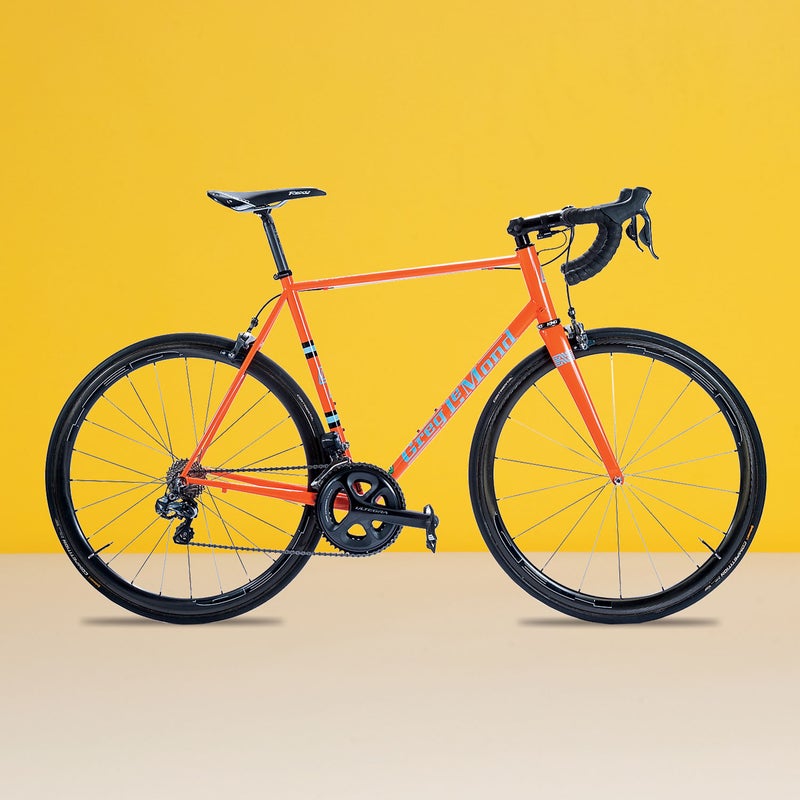 Best For: Riding all day. The Test: Greg LeMond’s new steel bike ($4,549), his first since 2010, reminds us of the man himself: purposefully counterculture, hard to ignore, and fast as hell. LeMond keeps the bike lively with Reynolds 853 steel, which has a bright, snappy feel. The classic geometry, with long headtube, top tube, and seatstays, was smooth and stable, and the Enve carbon fork adds to the silky road sensation. But with electronic Ultegra Di2, this is no throwback. The Verdict: Go race a gran fondo—and win. 18.1 lbs; greglemond.comHandling: 4.5Comfort: 4.5