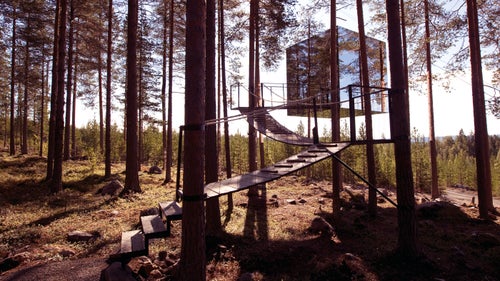 A floating hiding place, the Mirror Cube’s walls camouflage the space within and seamlessly reflect the surroundings and sky. To prevent birds from hitting the reflective glass, a transparent ultraviolet color, visible only to birds, is laminated onto the glass panes. The two-person space includes a bedroom, bath, living room, and roof terrace.