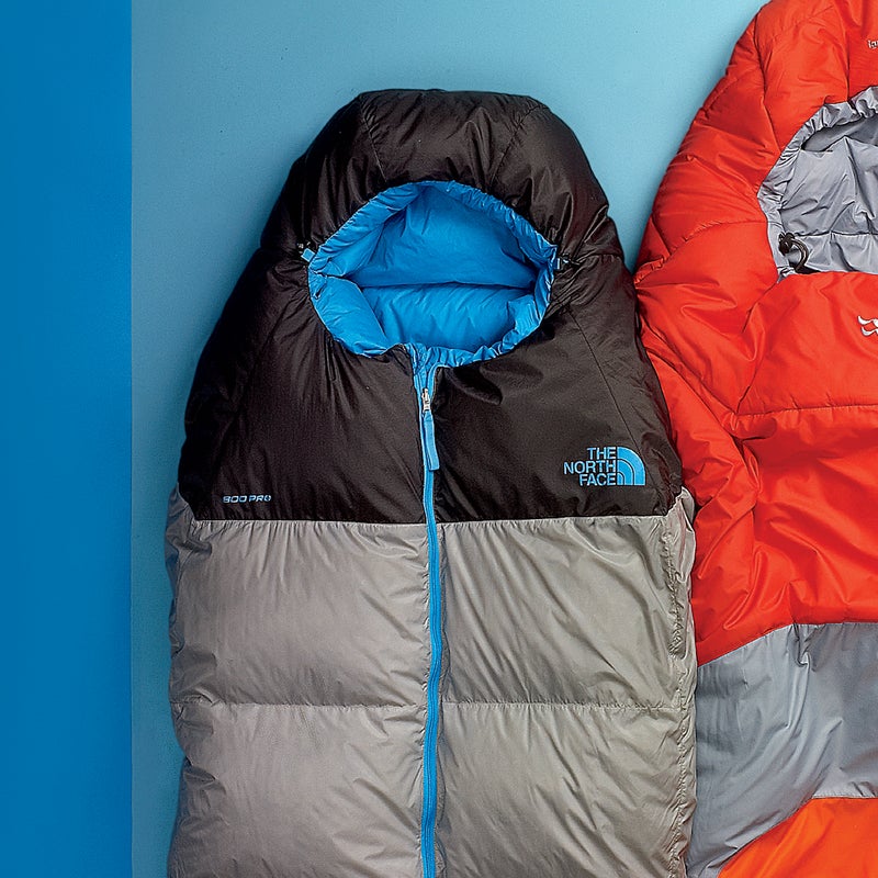 Best For: Ounce counters.
The Test: The name isn’t hyperbole—the 15-degree Superlight ($419) weighs less than two pounds and provides nearly four-season warmth. To make the weigh-in, some conveniences had to be nixed: the cut is pretty slim, and there’s only a half-length zip, which runs down the front of the bag instead of the side. Testers didn’t mind. “The center zip and snug fit made it feel like clothing,” said one. Another was sold by the water-resistant 800-fill down: “Lofty in 100 percent humidity. It’s converted me from synthetic to down.”
The Verdict: Our favorite ultralight down bag. 15°; 1.8 lbs; thenorthface.com
Sleep Comfort: 4
Warmth to Weight: 5