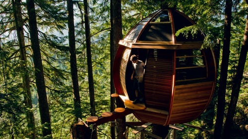 Just outside Whistler, the Hemloft hangs on a precipitous slope in a towering stand of hemlocks wrapped around a single tree. The structure’s oval shape masks internal structural elements, such as an al fresco camp-style kitchen and a small sleeping loft. A guest book encourages visitors to seek out, discover, and share their experience.