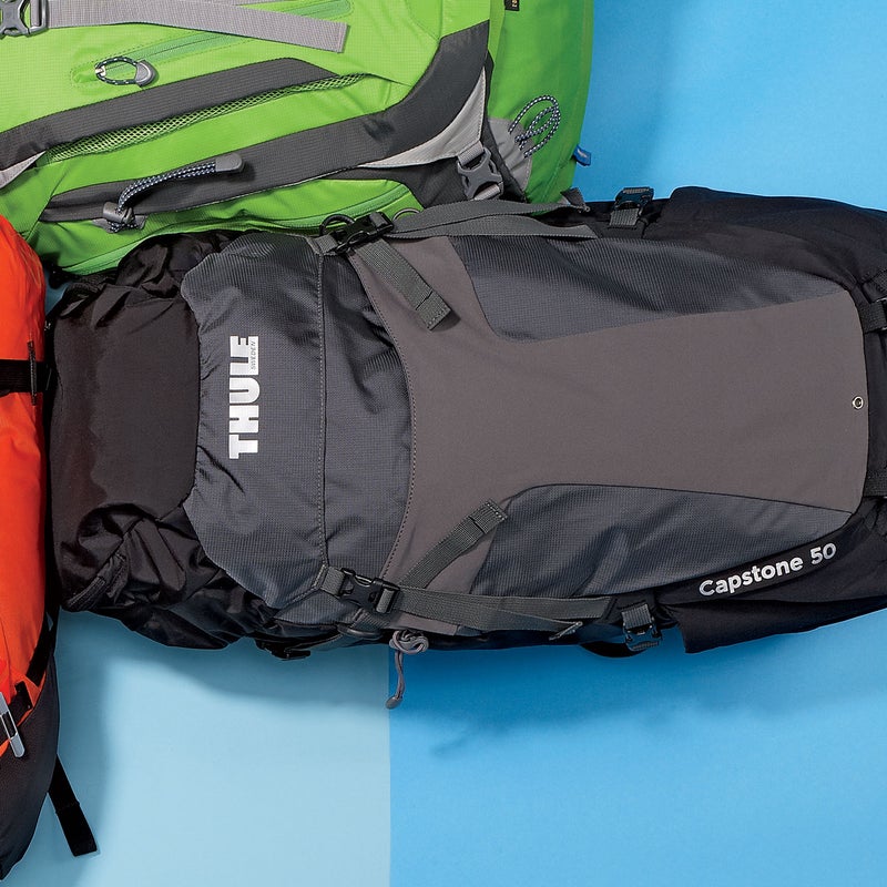 Best For: Smooth operators. The Test: We’re huge fans of Thule’s sleek and sturdy travel luggage, so we weren’t surprised by how much testers liked the Capstone ($200). The torso-adjustment system moves up and down on a track, making it easy to tweak fit on the fly without futzing around with straps—you just push a button and slide. The fabric is thick Cordura, the suspension system is sturdy, and it’s so well built and comfortable to wear that we’d tell you to go ahead and overload it, except you can’t: the top lid is fixed in place. The Verdict: “If Apple designed packs, this is what they’d look like,” said one tester. 3.3 lbs; thule.com Comfort: 4.5Versatility: 3