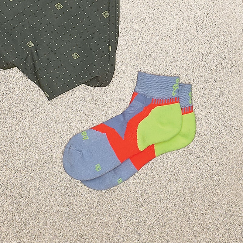 Made to tolerate big-mileage days, the Enduro ($11) has a structured arch and a ribbed top over the ankle, which keeps debris from working its way into your shoes. balega.com