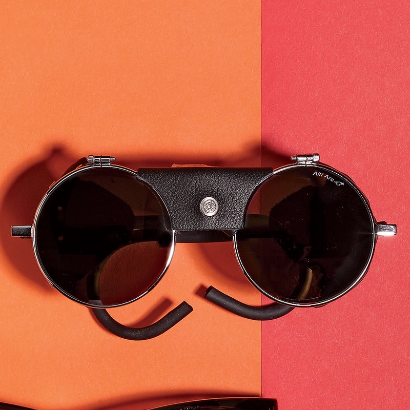 Best For: The aggressively hip.
The Test: Julbo’s 1950 glacier glasses ($260) are suddenly steampunk chic. The reissue is showing up on catwalks, and if you opt for the white leather trim instead of the original black, it’s way over the top—in a good way. Safety warning: don’t drive or do anything requiring peripheral vision. Also, though it rocked on a scramble up a sun-hammered slope, the mirrored brown-tint glass is too dark for less than searing brightness.
The Verdict: High-price, extreme looks. julbousa.com
Style: 5
Versatility: 2