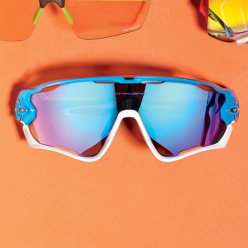 Best For: Riding skinny trails on fat tires.
The Test: These tricky new frames ($200) open with a hidden nose-piece latch so you can swap out lenses, then bite down (hence “jaw”) on the tint du jour. They were initially designed for pro roadies, but Oakley’s new warm brown poly Prizm trail lens ($100), with purply mirroring, screams for singletrack. With brilliant optics, you’ll see what you don’t want to run into. Check the cutouts for fog-eliminating ventilation.
The Verdict: One technofied hottie. oakley.com
Style: 3.5
Versatility: 5