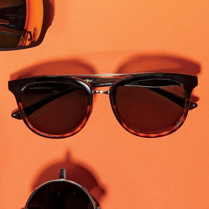 Best For: Brainiacs looking to hook up.
The Test: Applause for whoever thought to bridge the gap over the nosepieces with shiny gold wire. That bit of bling sexes up what could have been the same old round tortoise-frame glasses ($119). Brown polarized lenses, crafted from a proprietary synthetic, deliver optics as sharp as ground glass: colors throb, and details jump out. The lenses leak too much light for hard charging, but for playing around they’re just fine.
The Verdict: Instant classic. smithoptics.com
Style: 4
Versatility: 4