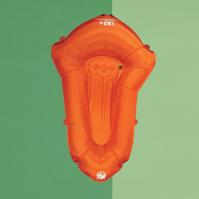 Best For: Fast and light adventures.
The Test: The hard part of pack rafting isn’t carrying your deflated boat to the next put-in—it’s hunching in the bare-bones cockpit. Klymit solved this problem by adding a few inches of height to the back of this six-foot-plus raft, creating a backrest. The funky-looking angular (rather than oval) waterline gives you a better view and helps you rip aggressive strokes, because the LiteWater ($200) dips lower where your paddle enters the water. The included drybag doubles as a bellows that can inflate the craft in five minutes. Note: not suitable for anything more advanced than Class II waters.
The Verdict: The smartest, comfiest pack raft yet. 2.2 lbs; klymit.com
Stability: 3.5
Maneuverability: 3