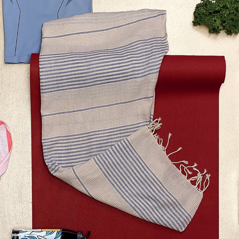 A scarf is the easiest way to dress up your workout uniform. We like the Mabel ($34) for its soft textured cotton and subtle colors, which reminded us of wandering Moroccan souks, even while grabbing coffee on the way to class. prana.com