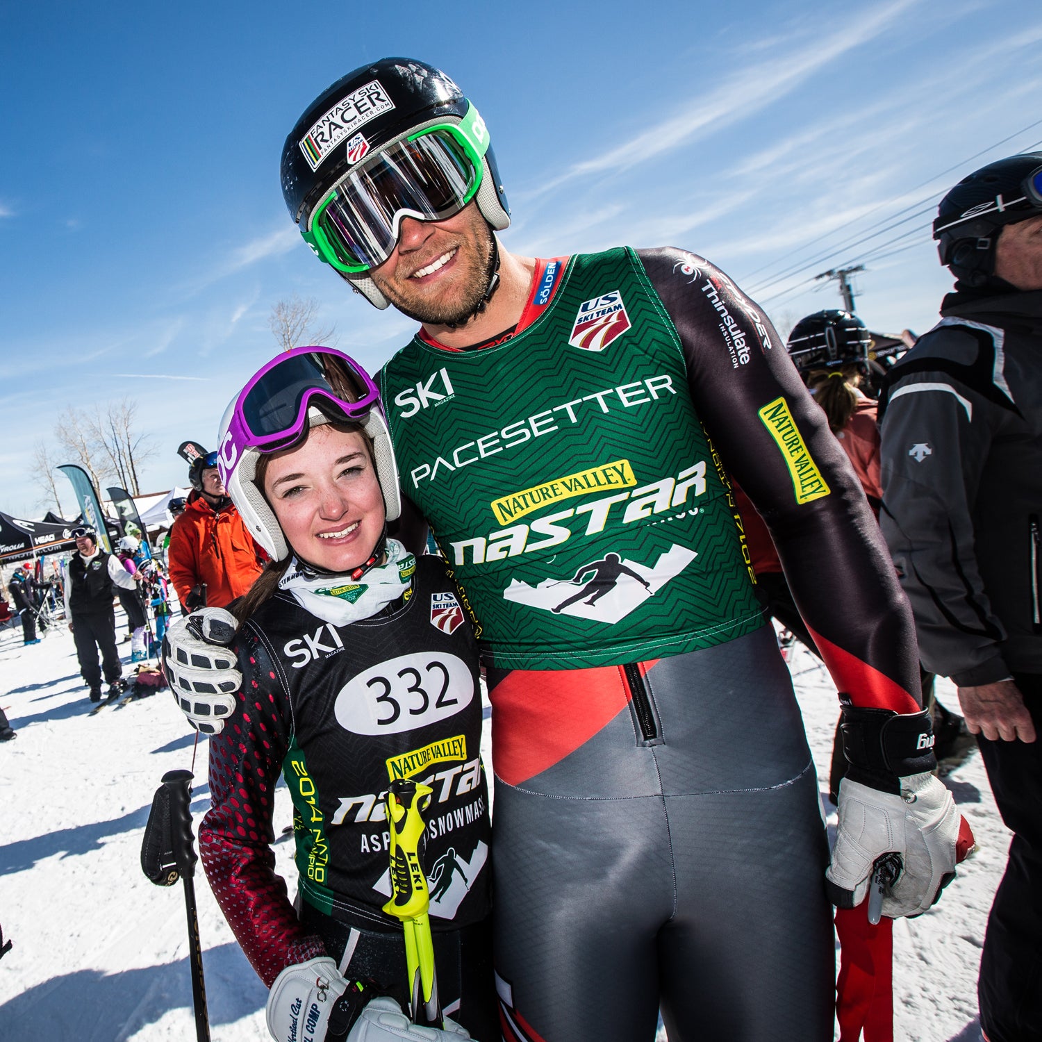 A young racer with Steve Nyman. The U.S. Ski Team will assume daily responsibility of Nastar to bring more awareness to ski racing.