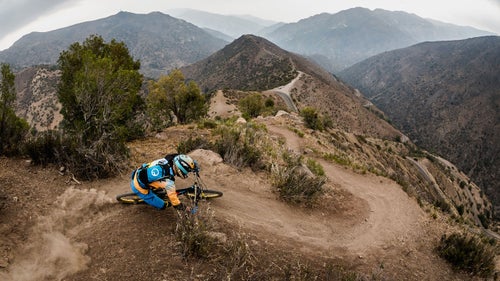 Eighty riders descended more than 30,000 feet from the Andes to the Pacific Ocean this February during Chile’s second annual Andes Pacifico, a four-day enduro race. Beginning high in the mountains, with stages comprised of leg-burning climbs and fast singletrack descents, the riders made their way through Chile’s wine region before finishing in the small coastal town of Mantanzas. Photographer Dave Trumpore captured the entire event, which, of course, included plenty of dirt, pisco sours, and Chilean barbeque. Photo: After climbing 37 switchbacks on asphalt, Frenchman Fabian Barel makes quick work of the twisty Parvazo singletrack on his way back down the mountain.