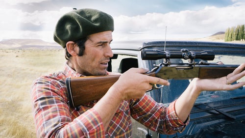 Andres Sorzana, who has spent much of his life in northern Patagonia as a polo player, avid hunter, and horse trainer, tested his aim with some targets on the hillside.