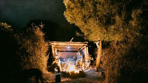 A small hunting shack, built to keep firewood dry through the winter, made for the perfect campsite.