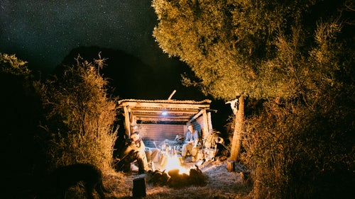 A small hunting shack, built to keep firewood dry through the winter, made for the perfect campsite.