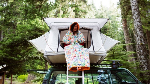 The vehicle-rooftop tent designed by Portland’s Poler Stuff folds open to create a space large enough for a queen-sized foam mattress. Formed from heavy-duty canvas, aluminum poles, and a ladder, the tent attaches to Thule or Yakima bars, and thus can be placed on nearly any vehicle.