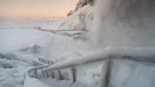 There’s no shortage of natural creativity in Iceland. To make this photo, I strapped on my crampons and braved the stairs. Spray from the waterfall not only helped me capture a scene right out of Frozen but also coated me with ice. The key to success? I kept moving, using my wipe cloth repeatedly on the Moment 18mm wide-angle lens. Pictured: Seljalandsfoss Waterfall.