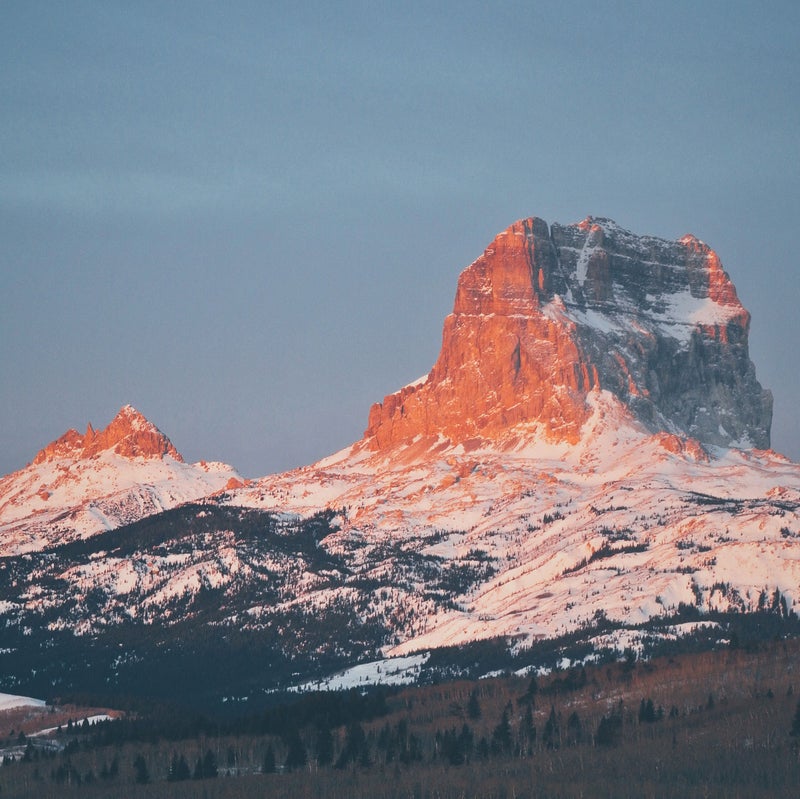 Chief MountainChief Mountain is such a unique peak. When I’m living on the east side of the park, I love to watch the sunrise as it lights up the sedimentary rock. Rock climbers also love this place, and it is unlike most other climbing areas. Do it: Chief Mountain is located on the border between Glacier National Park and the Blackfeet Indian Reservation in the northeast corner of the park. To view the mountain, you can take the Chief Mountain International Highway just north of the town of Babb.Rock climbers: Because the rock is so thin, it’s hard to get a solid anchor. A unique route-difficulty rating system has been devised specifically for climbs here, from 1 (an easy hike) to 6 (you need experience in sedimentary rock climbing).