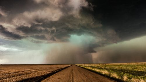 There was enough hail dropping out of this supercell that I only had enough time to expose a couple of hand-held frames. I was mesmerized by the way it hovered right over the center of the dirt road.