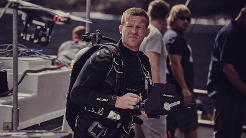 Casagrande prepares to dive near Guadalupe Island, Mexico. He never planned to become a cinematographer, he says, he just wanted to study sharks. He realized after working as a research cameraman that he preferred spending time with the animals in the water instead of analyzing data.