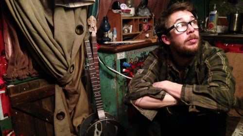 When he left the van during the day, he’d fish for Arctic grayling to fry on the woodstove and teach his mutt, Frett, to fetch and stack firewood.