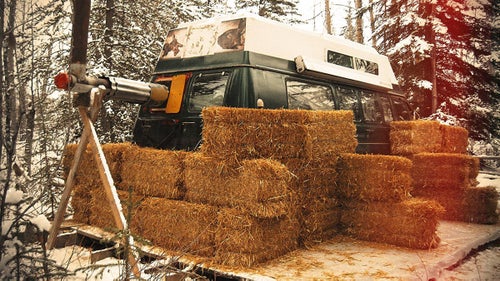 Next he had to fine-tune his hobbit hole.
He sealed off the stovepipe, which protruded from the back of the van, by surrounding it in metal shelving salvaged from the dump. This was an important step, and one he had to get right to ensure the haystack wouldn’t go up in flames.