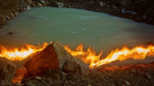 The flame line shows Lewis Glacier’s position in 2004. This is a relatively stable portion of the glacier, but it has still receded over 70 feet in the last decade.