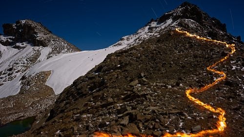 This portion of the glacier has receded more than 900 feet since 1934. At that time, the glacier stretched almost to the top of the peak on the right and covered the left side of the picture as high as the break in the scree slope, just below the vertical wall leading to the summit.