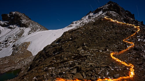 This portion of the glacier has receded more than 900 feet since 1934. At that time, the glacier stretched almost to the top of the peak on the right and covered the left side of the picture as high as the break in the scree slope, just below the vertical wall leading to the summit.