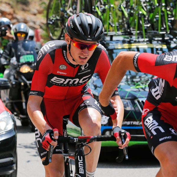 A teammate helps Tejay van Garderen of the U.S., left, after he fell ill during the seventeenth stage of the Tour de France.