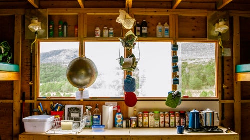 Dry Creek Basin Hut, on day three, looks out on the southwestern Colorado mesa. Every hut's stovetop view makes getting involved with dinner prep worth it. From a giant wok to Ginsu knives, pretty much everything you need to cook is here. If you’re lucky, you’ll end up sharing a hut with a backcountry chef.