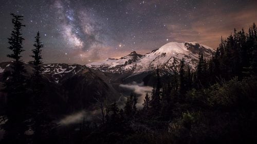 West Coast wilderness and travel photographer Brad Goldpaint took second place in the Beauty category with this photo. It shows a moonlit Mount Rainier in Washington with the Milky Way overhead in July 2014.