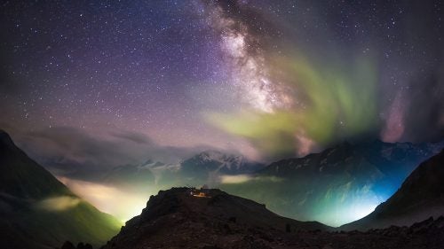 This image was taken by panoramic photographer Evgeny Trisko in the northern Caucasus Mountains in Russia in August 2014. It shows Mount Elbrus and the Peak Terskol Observatory beneath the Milky Way, which is partially obstructed by clouds reflecting lights from the ground. Trisko’s work took second place in the Against the Lights category.