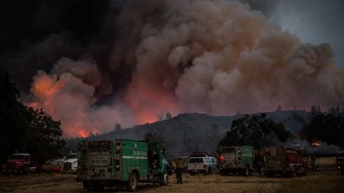 Firefighters watch the Rocky Fire advance in Lake County, California, on July 30.