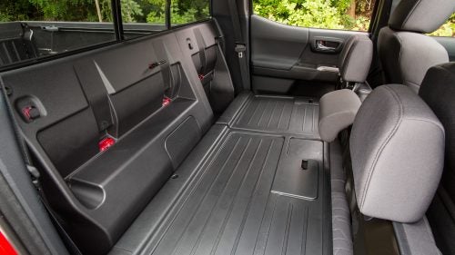 Toyota gave the interior a big update. It now features higher-quality plastic, and new, comfier fabric seats that work better in extreme temperatures. In my test, I found the cabin workmanlike sharp—but still utilitarian (as it should be).
In the Double Cab, the rear seats fold forward and provide a hard-plastic loading surface that’s big enough for a pair of 80-liter expedition packs and your grimy hiking boots. You can also get the SR Utility Package, essentially a version of the Double Cab sans rear seats, giving you as much interior cargo space as possible.