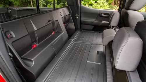 Toyota gave the interior a big update. It now features higher-quality plastic, and new, comfier fabric seats that work better in extreme temperatures. In my test, I found the cabin workmanlike sharp—but still utilitarian (as it should be).
In the Double Cab, the rear seats fold forward and provide a hard-plastic loading surface that’s big enough for a pair of 80-liter expedition packs and your grimy hiking boots. You can also get the SR Utility Package, essentially a version of the Double Cab sans rear seats, giving you as much interior cargo space as possible.